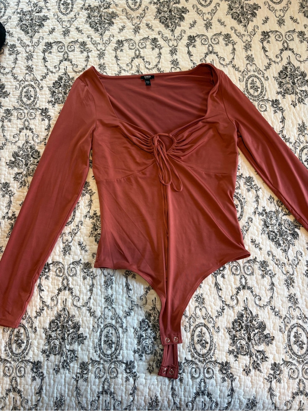 Express Rust Long-Sleeve Twist Front Bodysuit